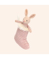 Peluche lapin dans sa chaussette de Noël rose de Jellycat