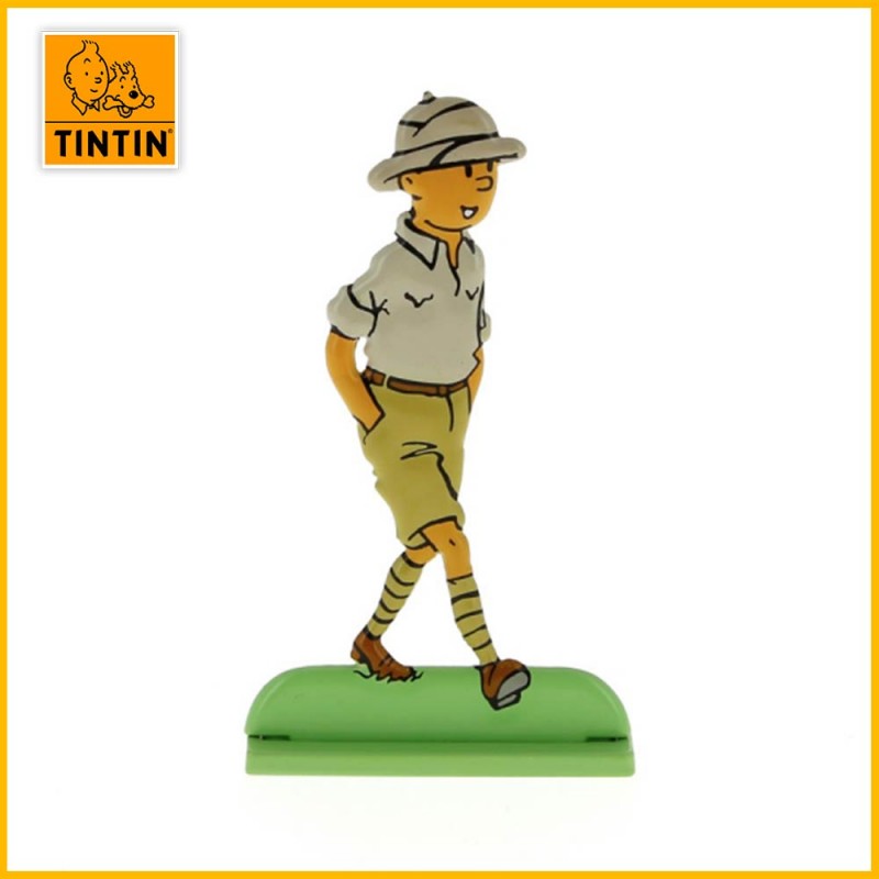 Tintin se promène dans un village du Congo